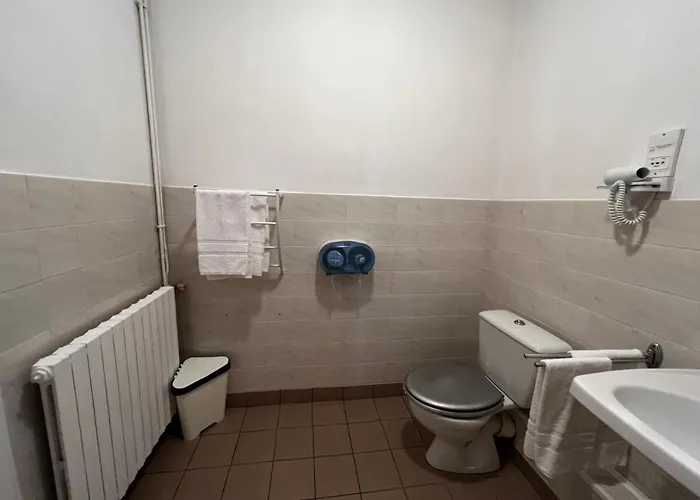 Отель Contact Les Montois