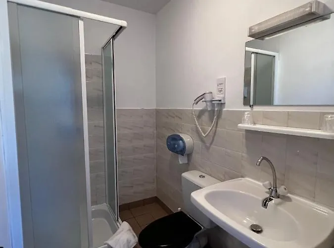 Отель Contact Les Montois